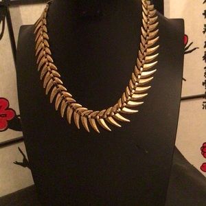 Gold Tone necklace with sparkling feathery accents